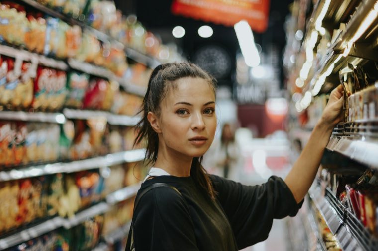 Young woman shopping for groceries